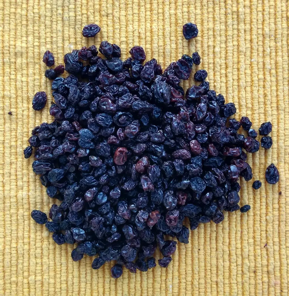 Traditional wooden racks used for sun-drying wild blackberries